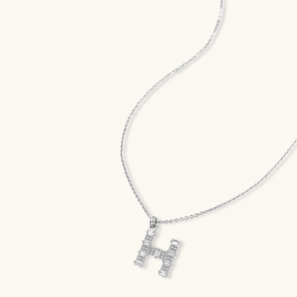 Letter H jewelry set featuring geometric crystal design in gold and white gold plated finish with adjustable chain necklace